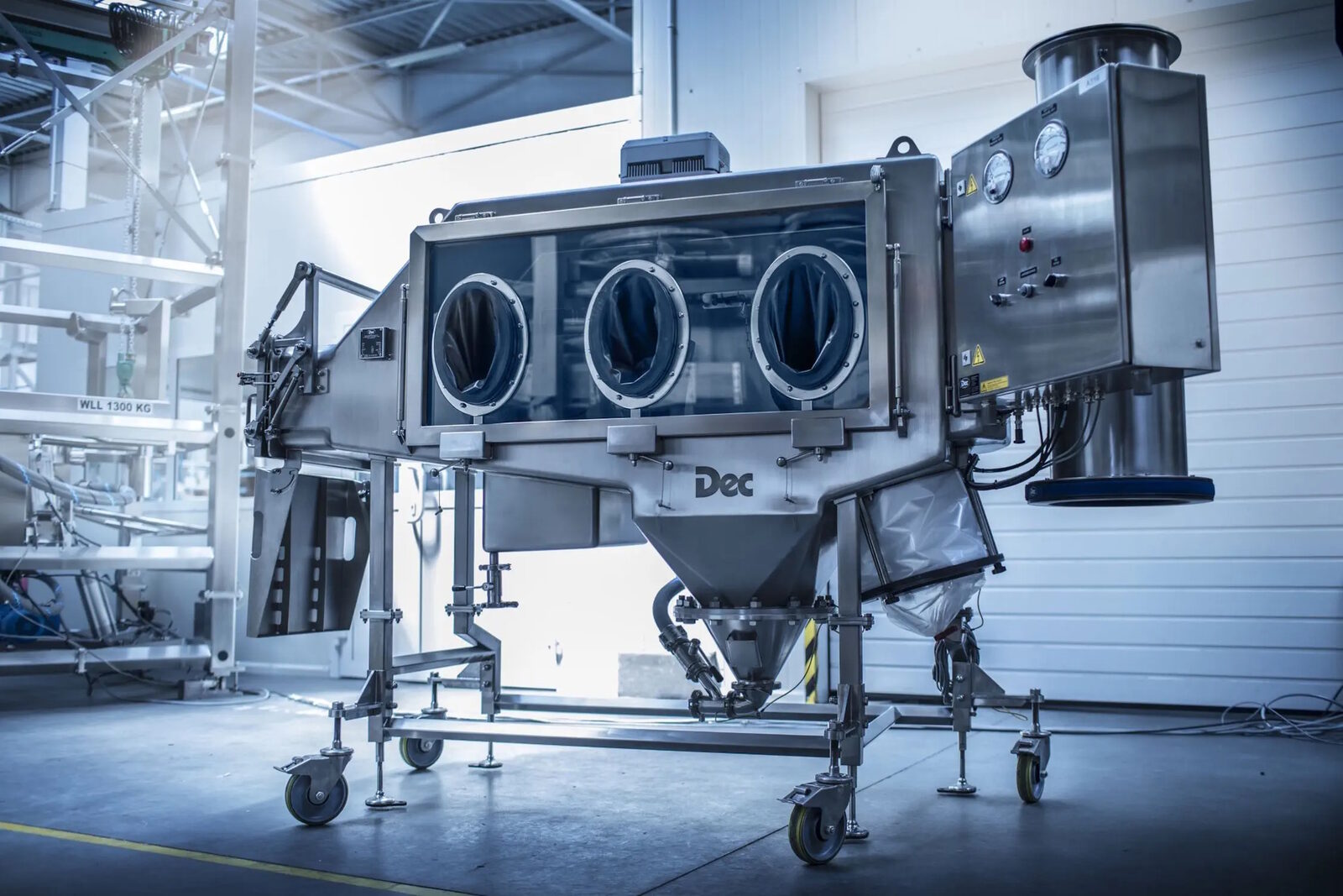 DEC IsoPharm containment isolator with glove ports and discharge hopper