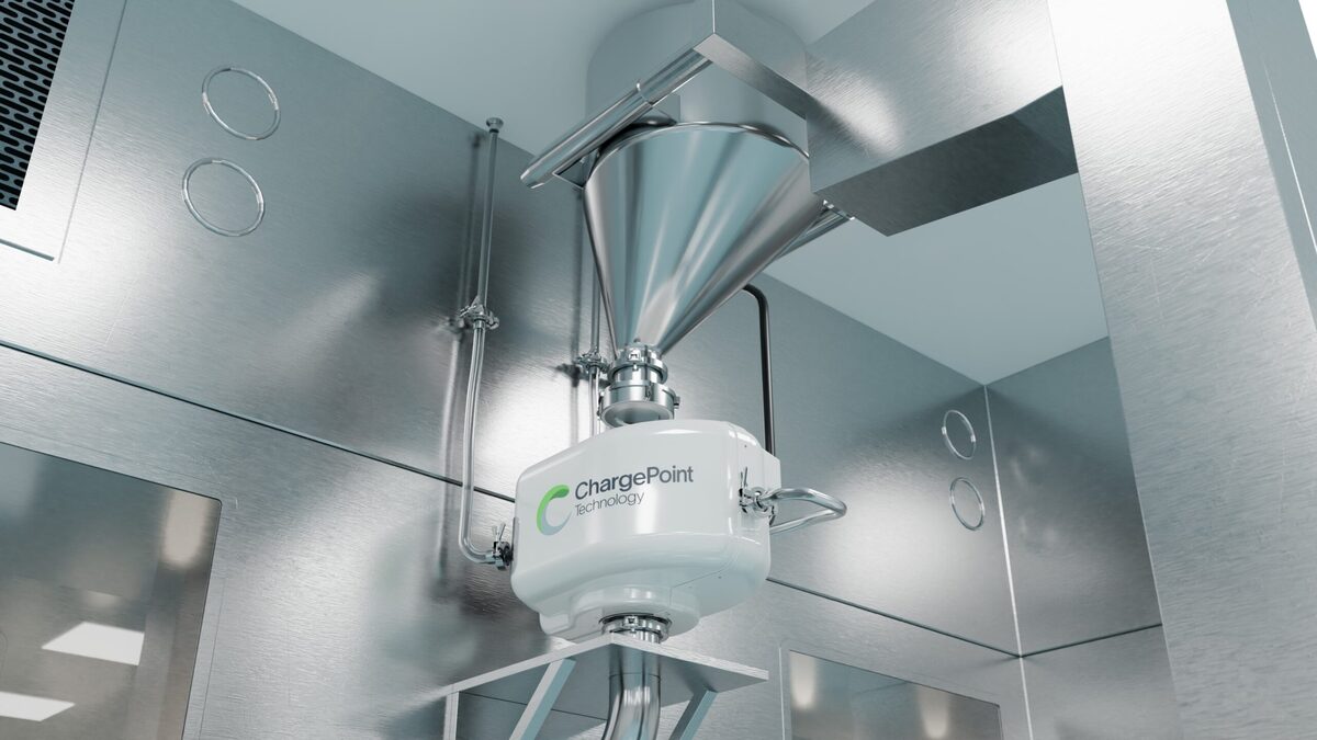 ChargePoint Actis aseptic transfer system installed beneath a hopper in a stainless steel process suite